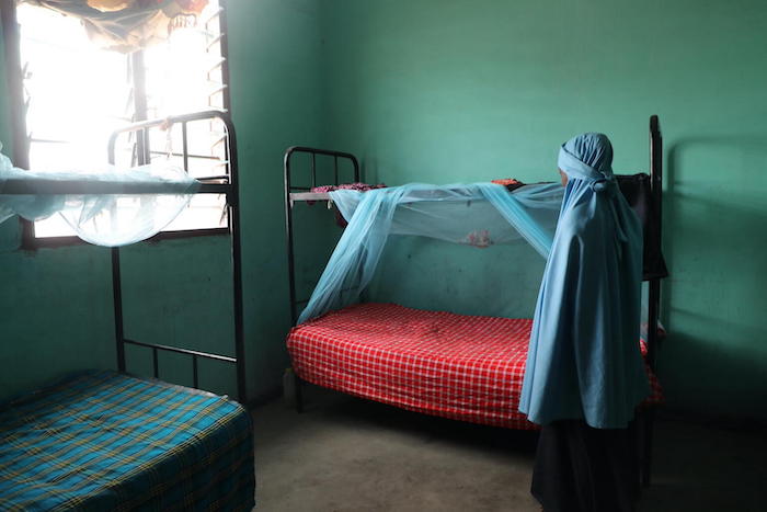 Amira, 12, in her room at the UNICEF-supported Garissa children rescue center in Kenya where she is staying after escaping a forced marriage.