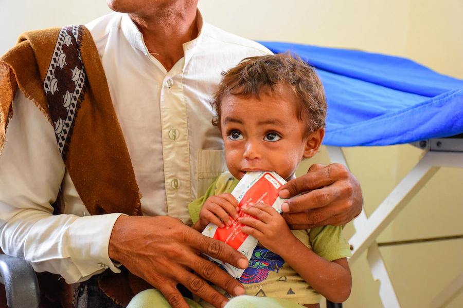 Ebtihal, 7 months old, is given Ready-to-Use Therapeutic Food (RUTF) as treatment for malnutrition at the UNICEF-supported Al Aman Health Unit in Hajjah Governorate, Yemen.
