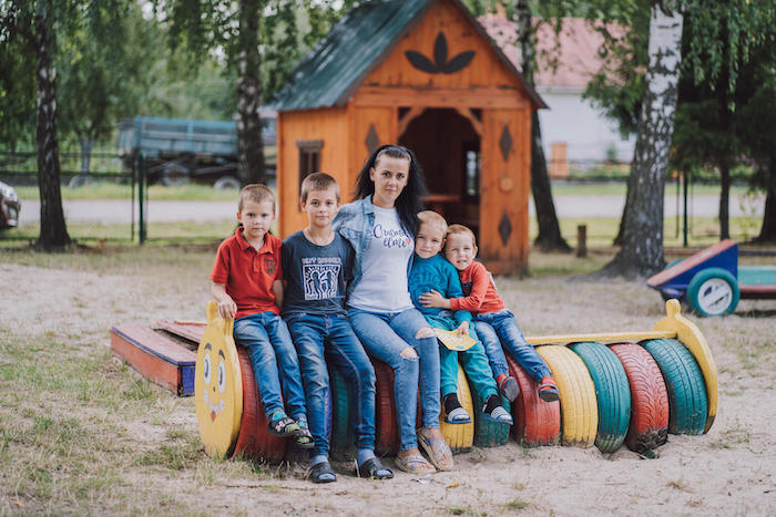 A mother with her four children in a park in Ukraine
