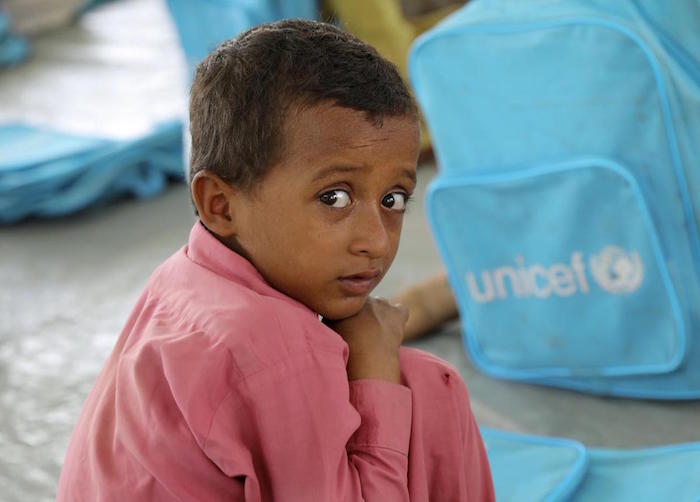 Sarfraz, 5, received a UNICEF bag, books and supplies on his first day at a Temporary Learning Center in Lasbela district, Balochistan Province, Pakistan. 