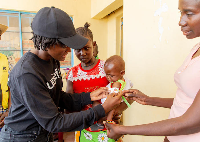 UNICEF Goodwill Ambassador Vanessa Nakate, left, at the UNICEF-supported Kobuin Health Facility in Turkana County, Kenya. 