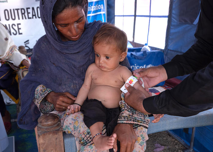 Nazira brings her 6-month-old son, Naqibullah, to be screened for malnutrition at a UNICEF-supported mobile health center in Balochistan. 