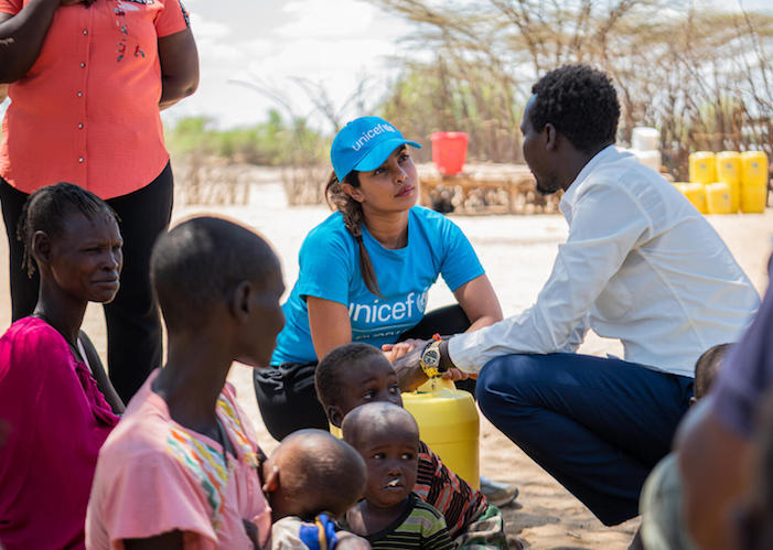 UNICEF Goodwill Ambassador Priyanka Chopra Jonas speaks with mothers and an interpreter at a health center in Turkana County, Kenya. 