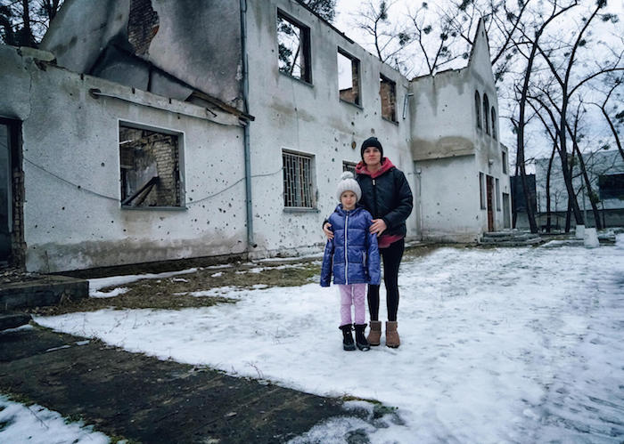 Eight-year-old Eva shares a small room with her mother and sister in a modular complex for people who have lost their homes in Irpin, Ukraine.