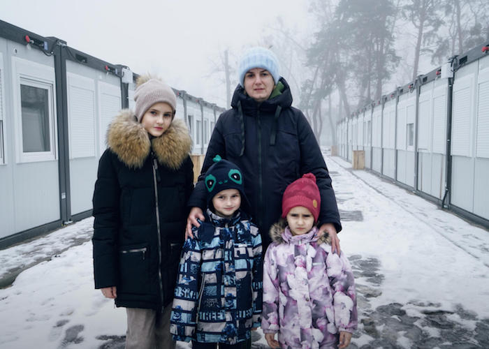 Tetyana and her children live in an Irpin, Ukraine, modular temporary housing complex for families displaced by the war. 