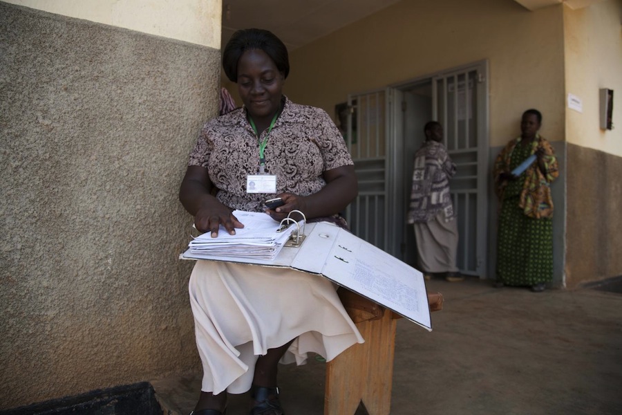 A nursing officer in Uganda uses the UNICEF mTrac system to collect and send public health data to district headquarters.