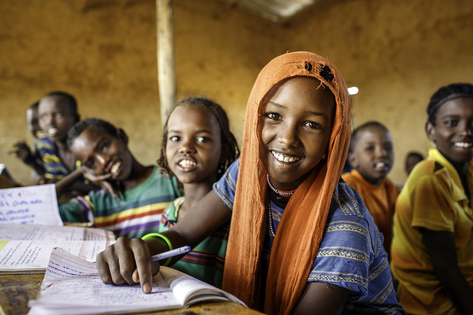 Esa Ali Mohammad, 11, 4th grader at a primary school,  studies with her classmates in Afar region of Ethiopia 