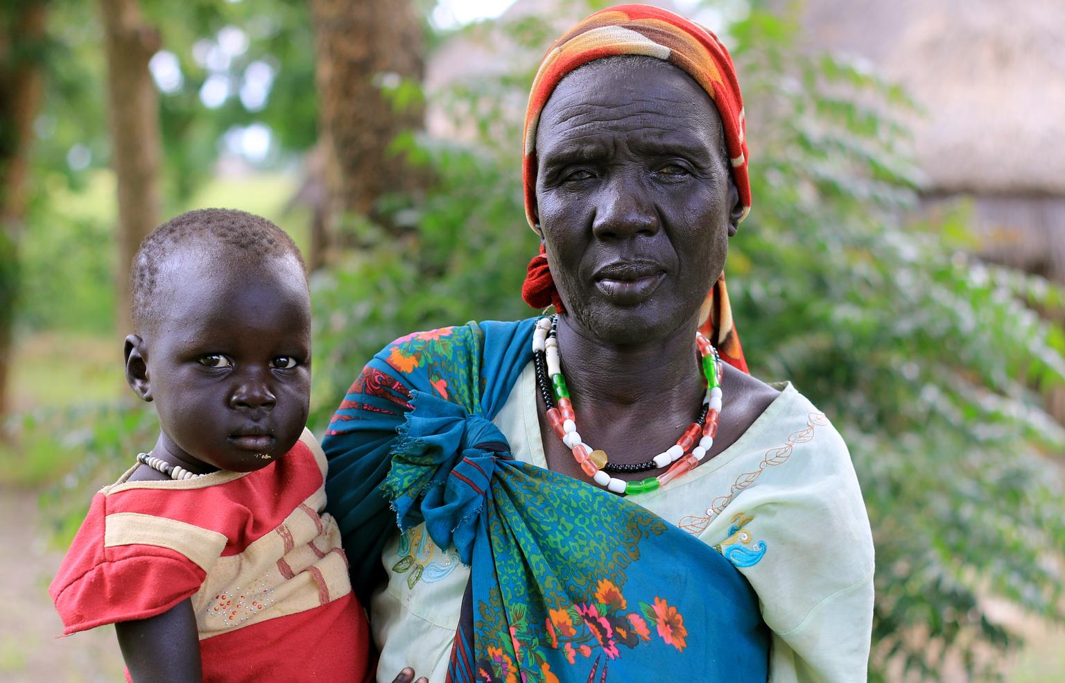 Nyatay Gatkuoth holds Nyahuach Ter, her 3-year-old, in Kiech , South Sudan, where UNICEF and partners are assisting people affected by the conflict.