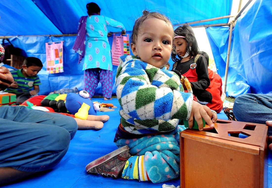 On 30 April, children play in a tent housing a UNICEF-supported child-friendly space in Tundikhel, a large grass-covered area and important landmark in Kathmanudu, the capital.