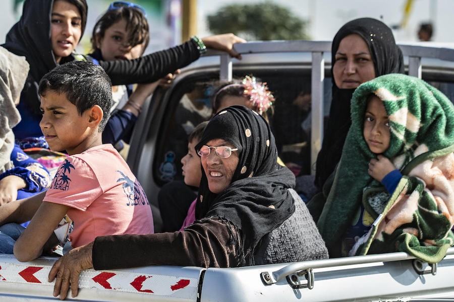 Families continue to flee escalating violence in northeast Syria in October 2019.