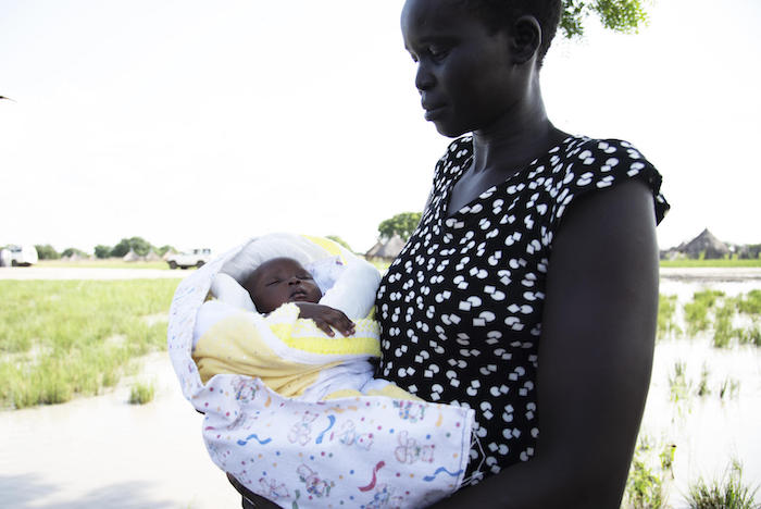 Rebecca Akuot gave birth to 1-month-old Deu as floodwaters were approaching her house in Panyagor, South Sudan in September 2019.