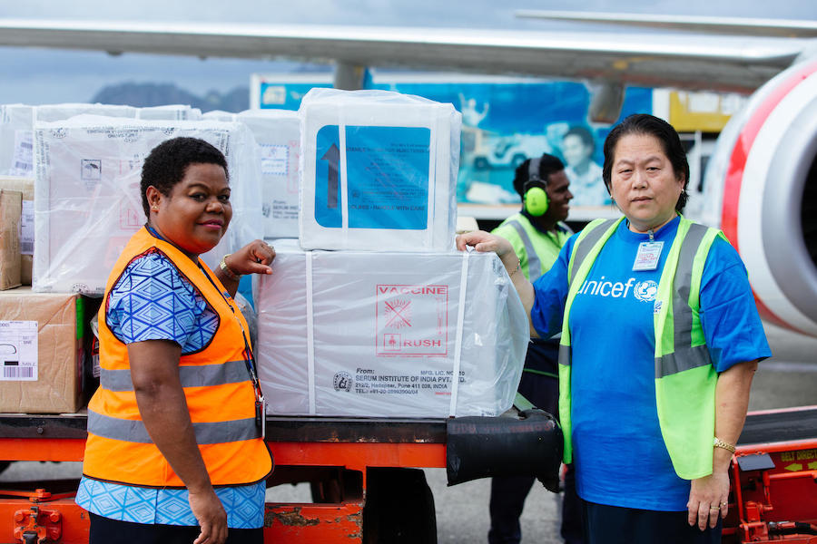 On November 30, 2019, measles vaccines and related medical supplies arrive at Nadi International Airport in Fiji, where they are unloaded by UNICEF staff members. 