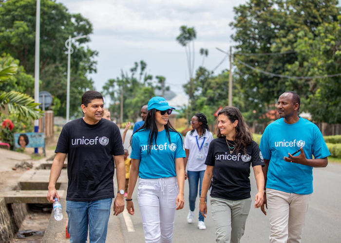 During their visit to Rwanda in 2020, UNICEF USA and NextGen visit a family in Rubavu District to learn how community health workers educate communities on Ebola prevention.