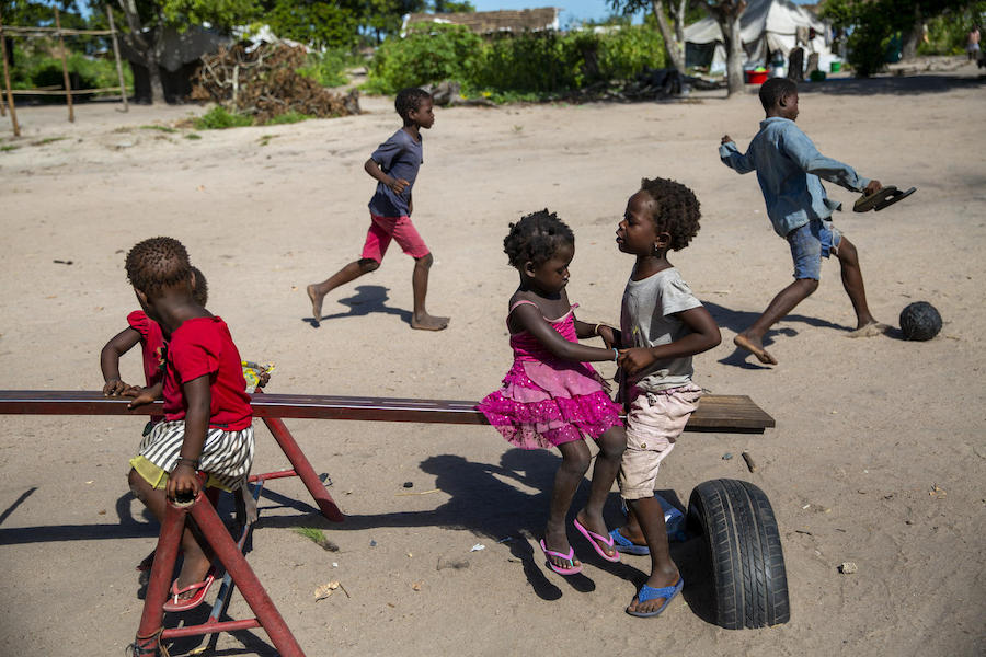 Children play at a UNICEF child friendly space in the Mandruzi Resettlement neighborhood, Mozambique.