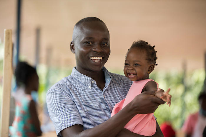 During the COVID-19 lockdown, Herbert from Uganda brought his 1-year-old daughter Donatel to a UNICEF-supported health center to get immunized against polio and other vaccine-preventable diseases.