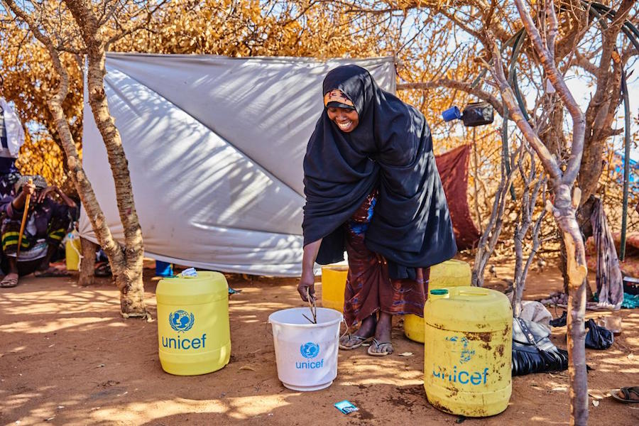 In Kenya’s Garissa County, Habiba Rage demonstrates how she uses household water treatment chemicals provided by UNICEF. 