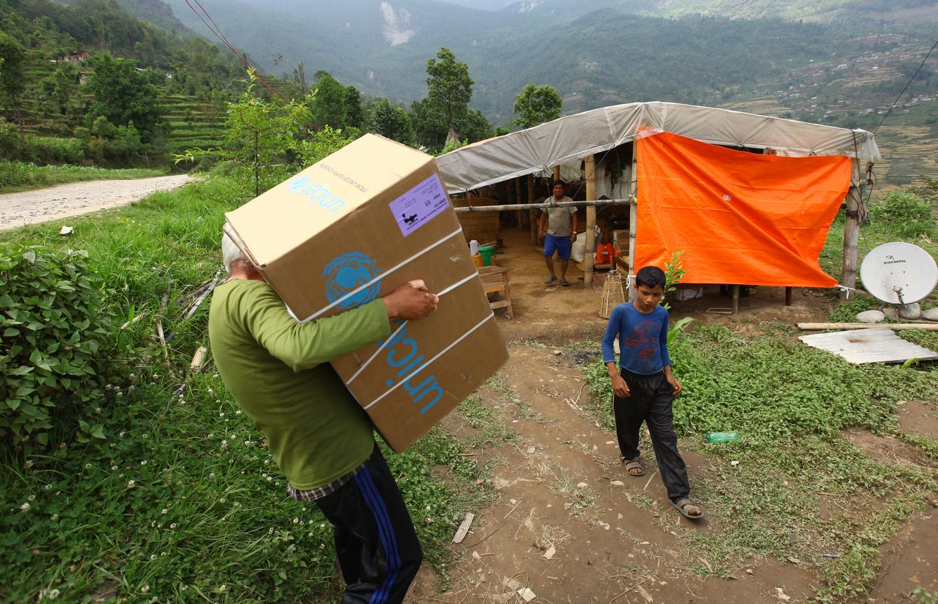 On 16 May 2015, UNICEF relief items are distributed in Chamawati village in Dolakha, epicenter of the 7.3 Richter scale earthquake that struck Nepal on 12 May. Nepal was first struck by a 7.8 Richter scale earthquake on 25 April.