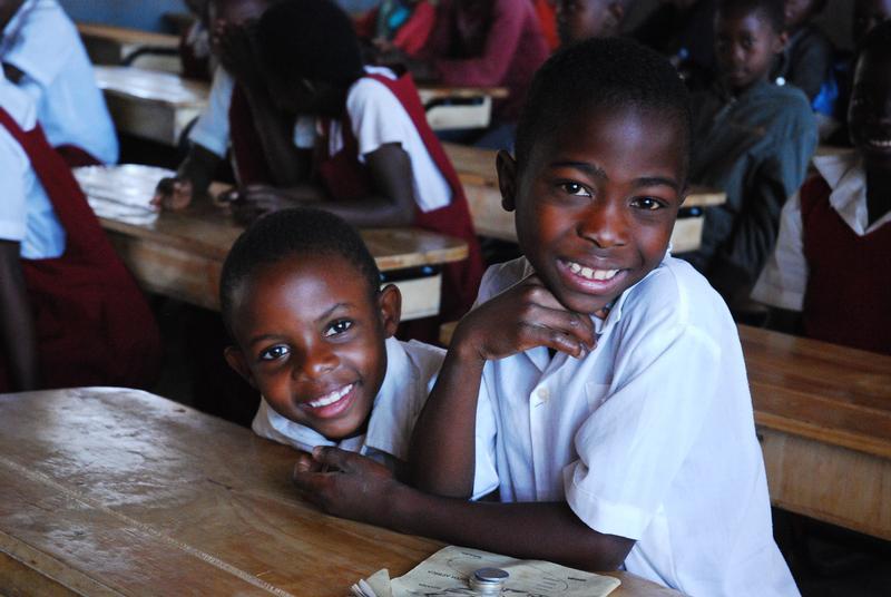 Students in Malawi benefit from desks provided by the K.I.N.D. fund.