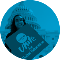 A UNITER holding a sign reading 'Advocacy Action' 