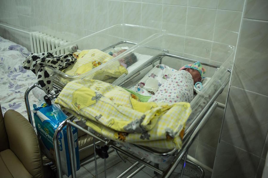 Two newborn babies being cared for at a makeshift maternity ward in Ukraine in March 2022.