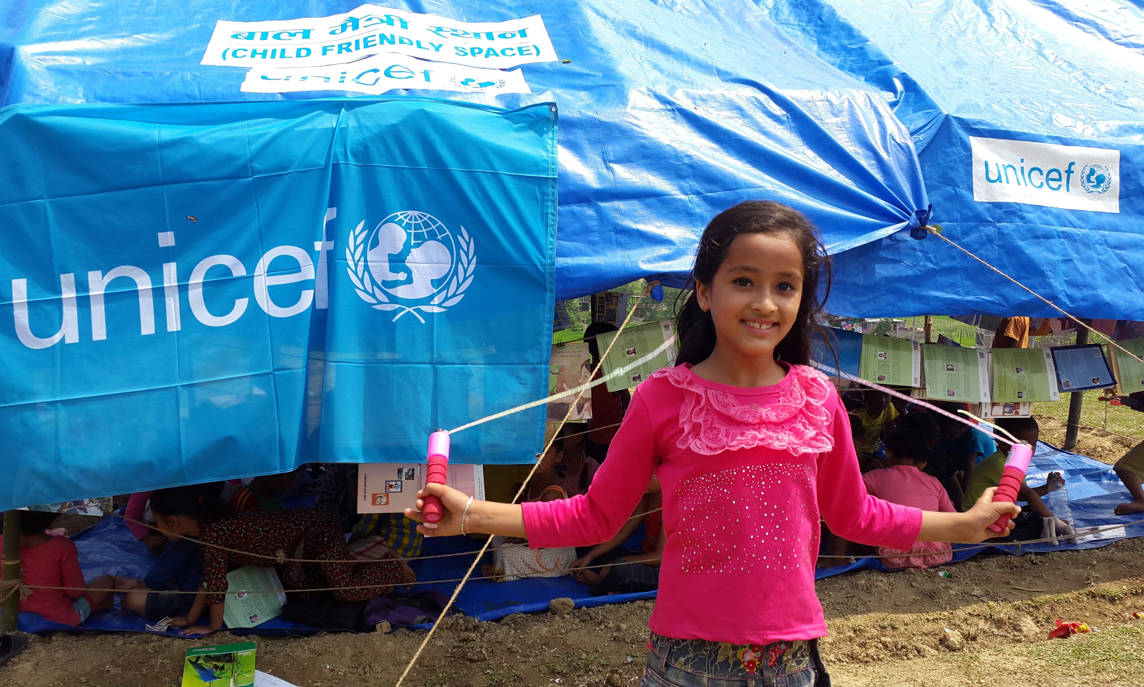 Child Friendly Spaces offer safe, protective places for children like Rejina to play and participate in learning and recreational activities under adult supervision. Child Friendly Spaces offer safe, protective places for children like Rejina to play and participate in learning and recreational activities under adult supervision.