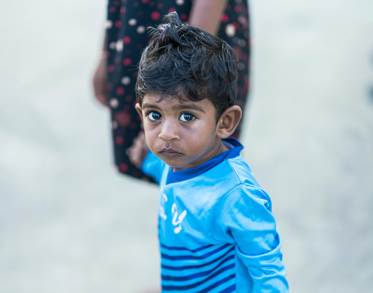 A boy living in the Maldives where many communities face heightened risks of climate change impacts and where UNICEF supports adaptation and mitigation measures..