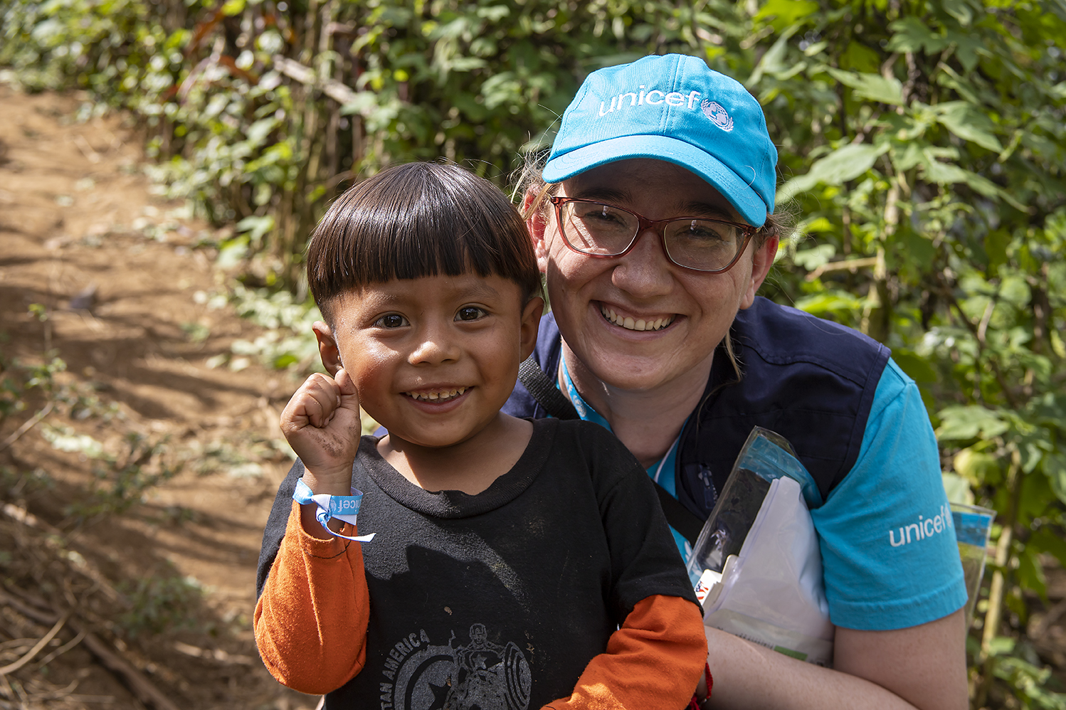 Paola Baldizon, Communication Consultant at UNICEF Guatemala, with Herson, 4, in San Cristobal, Alta Verapaz, Guatemala on Feb. 27, 2022.