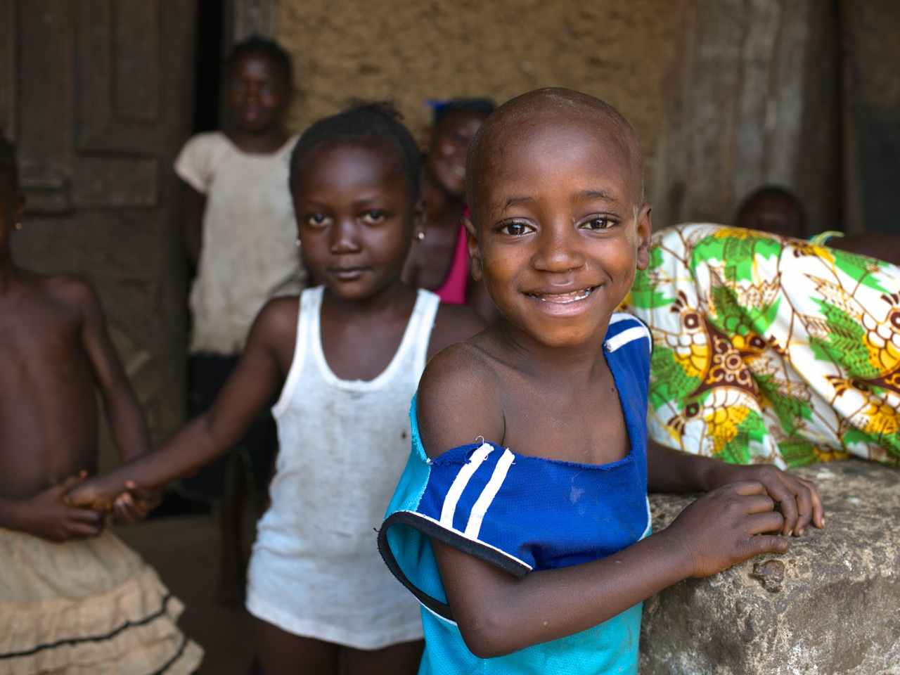Vandy J., 7, and his 9-year-old sister, Jina J., living in Sierra Leone, are two of only seven members of their immediate family who survived Ebola.  They received care at a UNICEF-sponsored treatment center in July 2014.