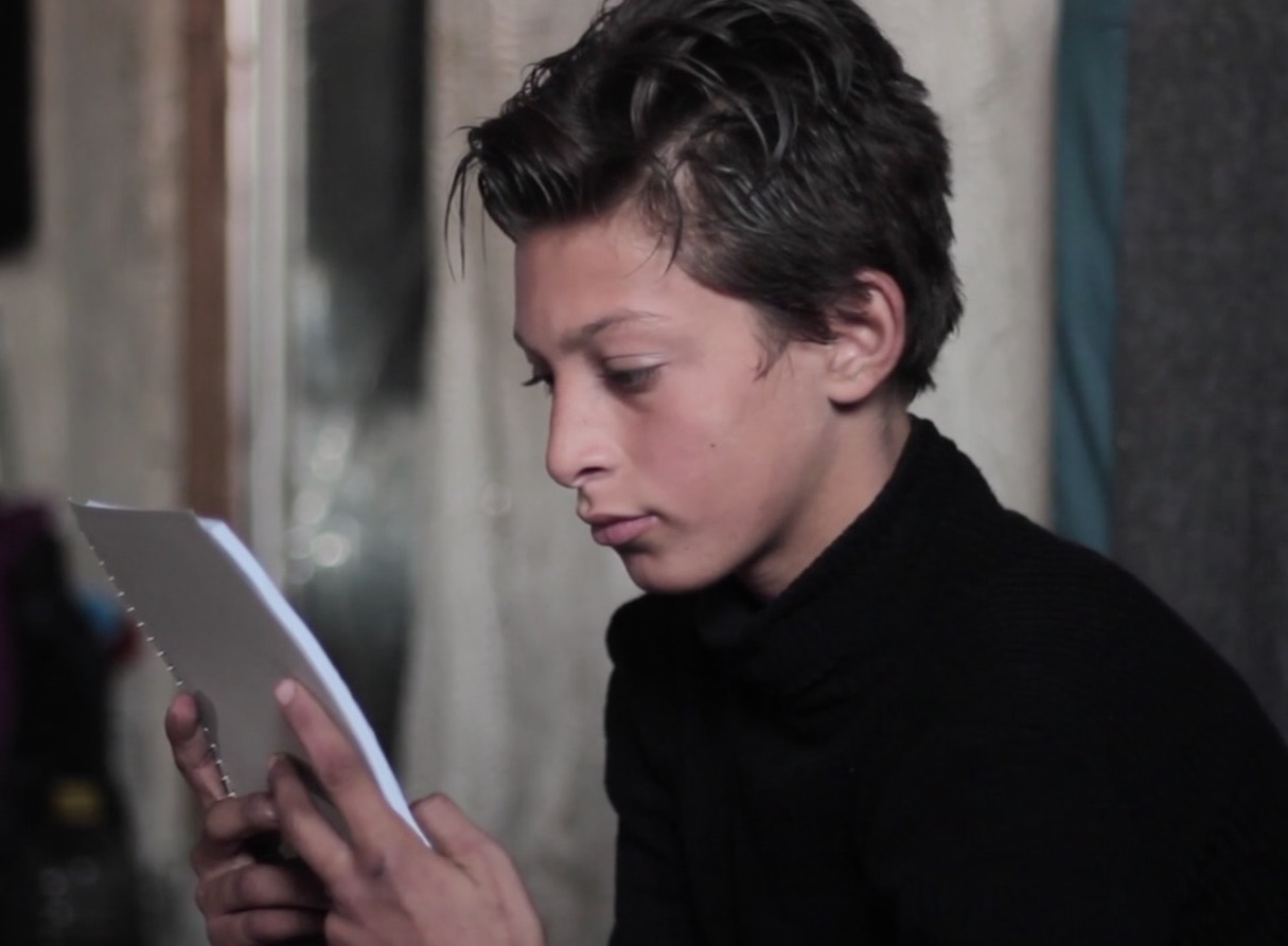 Moheb, 11, lives in Aleppo, Syria where half his friends have left or died in the war. Chores, school and work, leave little time for studying but with dreams of a law degree and helping his country regain peace, he presses on