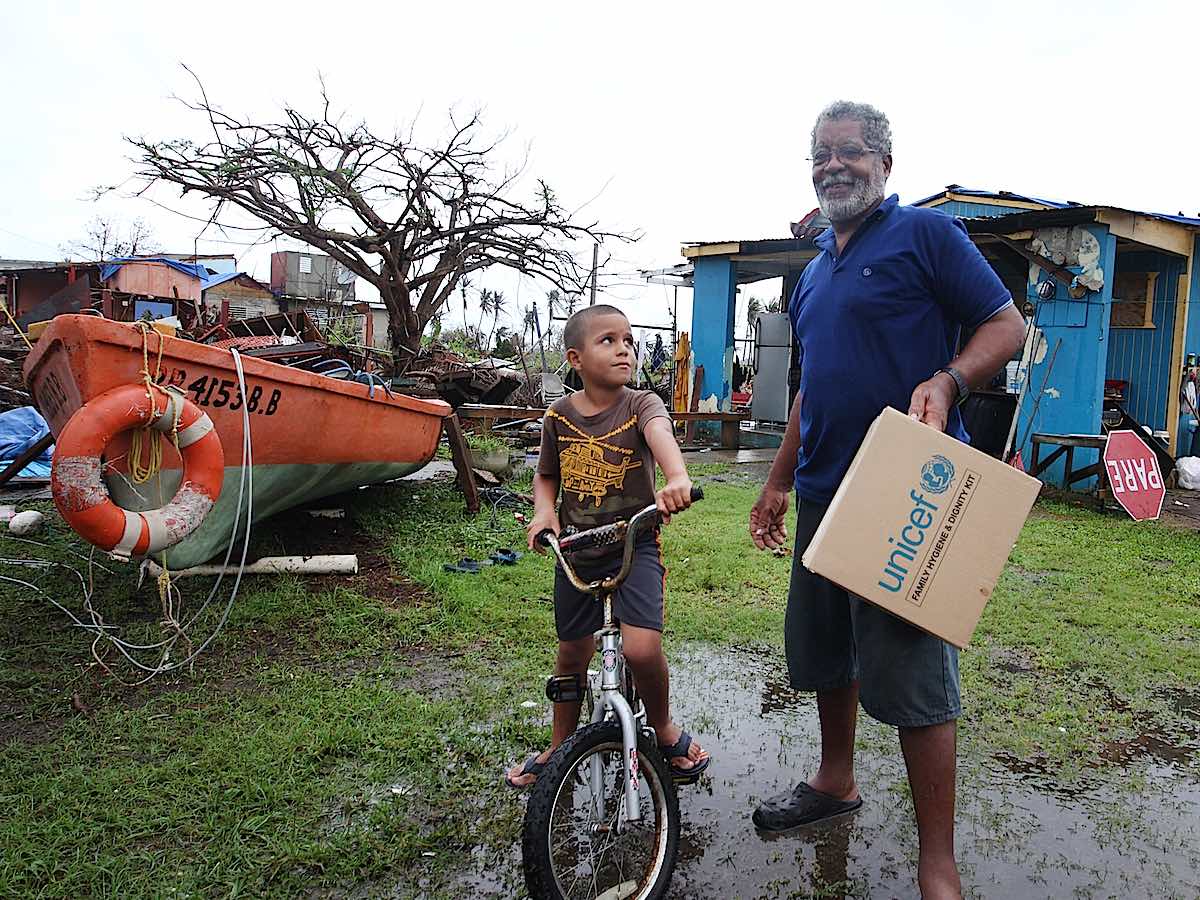 After Hurricane Maria hit Puerto Rico, a father and son received a Family Dignity and Hygiene Kit from UNICEF USA