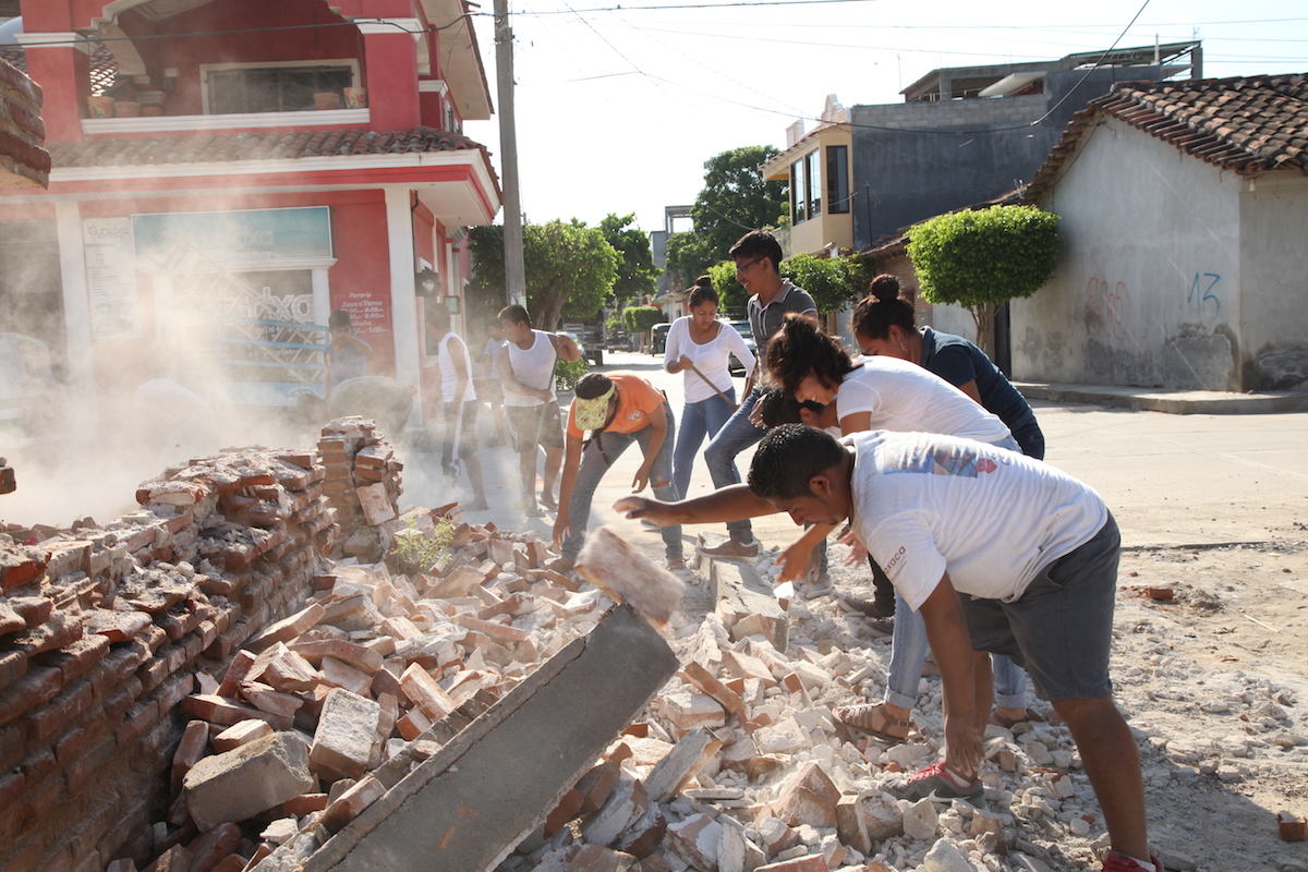 On 9 September 2017 in Oaxaca, Mexico, adolescent volunteers from San Blas Atempa help to remove debris and clear the streets of San Mateo del Mar affected by the earthquake.