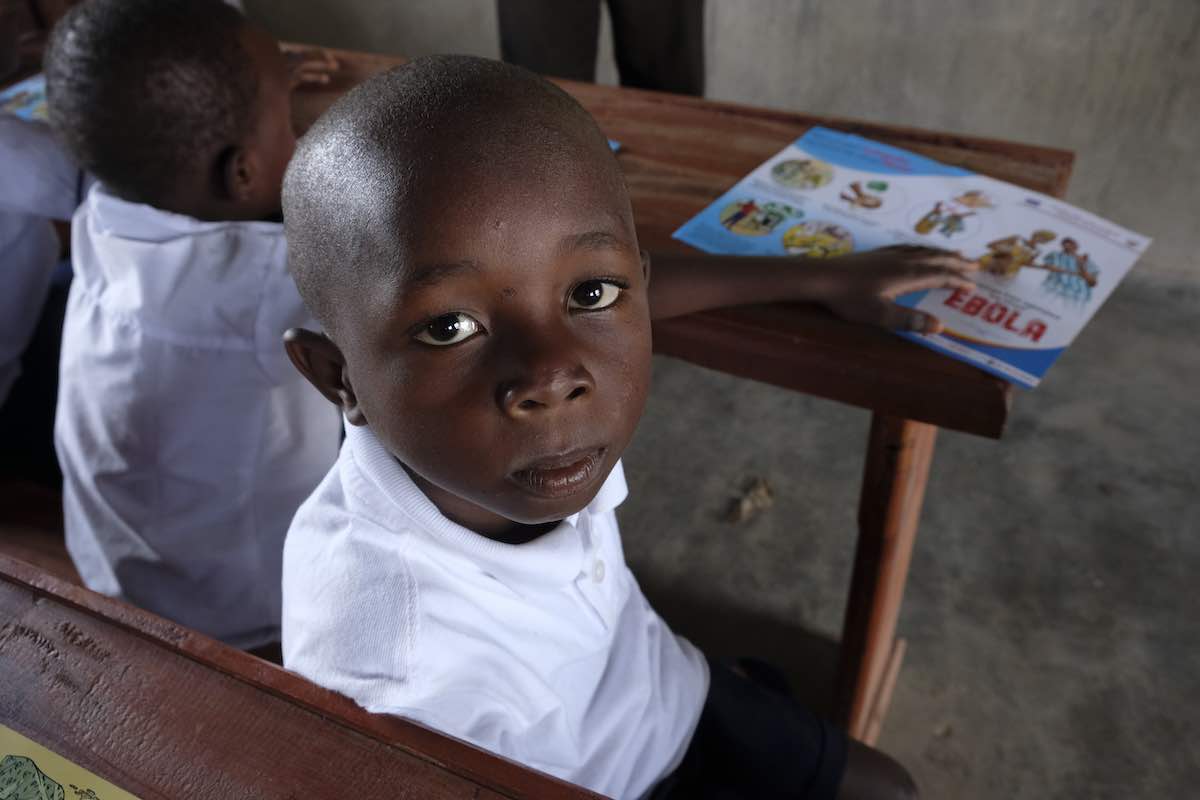 Beni, Kambale, 7 years old, attends school in the Ndindi neighborhod of Beni, Democratic Republic of Congo, which has been hit by an Ebola epidemic. “Today I learned that we should wash our hands, and if we don’t, we could die from Ebola,” says Kambale.