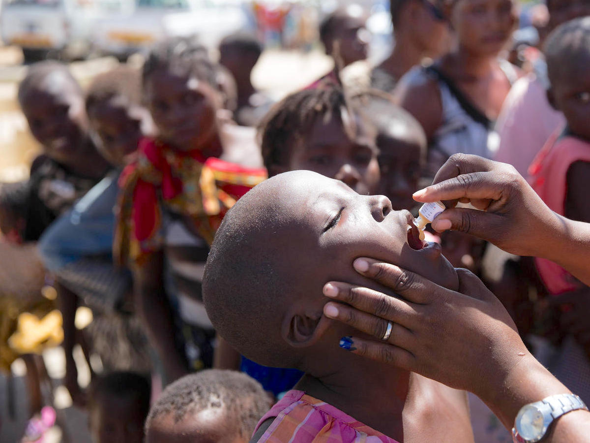 On April 3 in Beira, Mozambique, a child receives the vaccine for cholera as part of a UNICEF-supported immunization campaign in the wake of Cyclone Idai. 