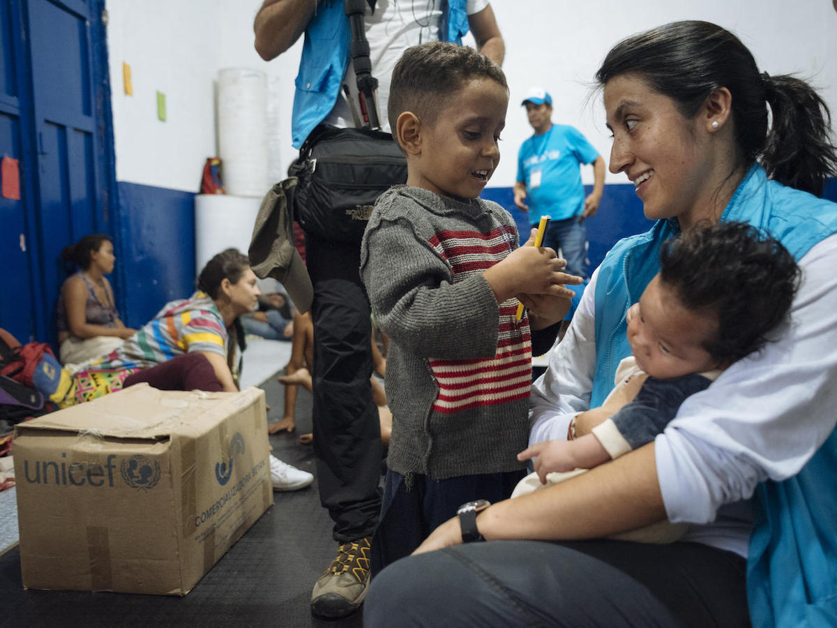 On April 24, 2019 in Cucuta, Colombia, UNICEF Communication for Development specialist Andrea de la Torre talks to children who recently arrived from Venezuela. 