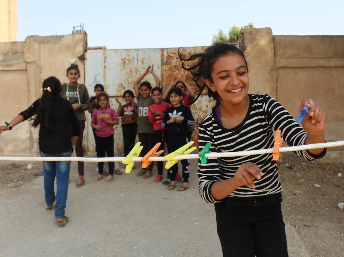On October 28, 2019 at a shelter in Hasakeh City, Syria, Amani, 12, takes part in game organized by UNICEF staff to help displaced children heal from trauma. 