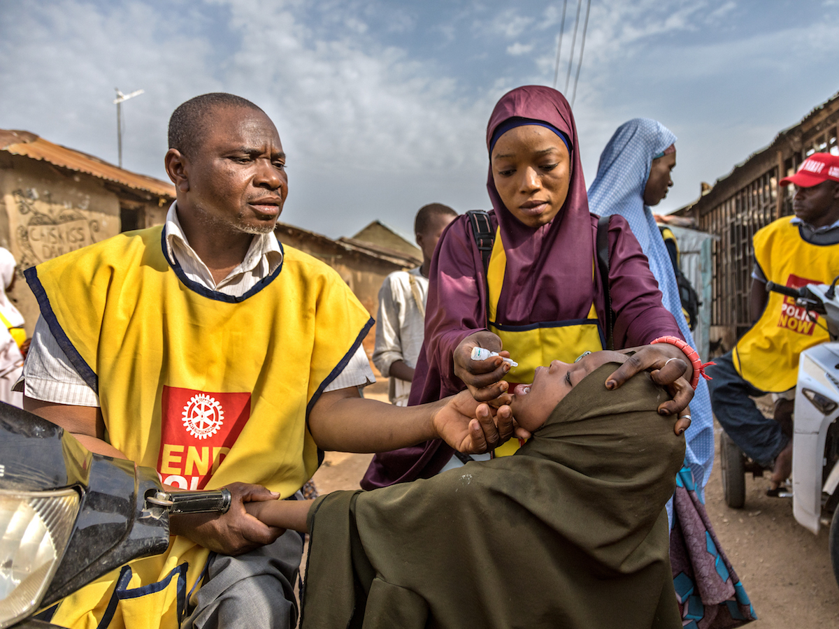 Health workers and volunteers participate in a polio immunization campaign in Kaduna, Nigeria in 2019. 