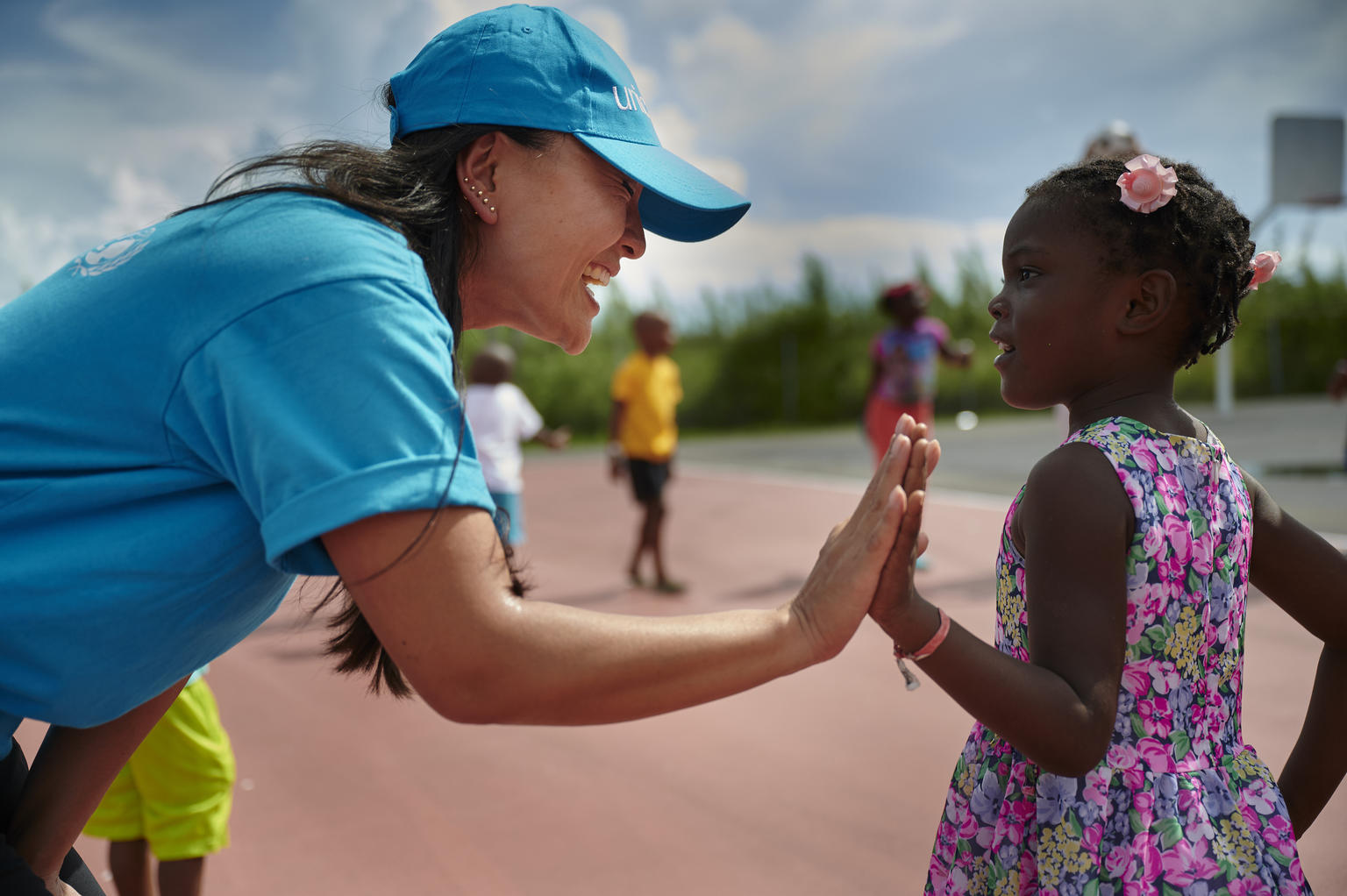 In September 2019 in the Bahamas, children who have been evacuated in the aftermath of Hurricane Dorian participate in activities organized by UNICEF's partner organization, IsraAid, in Nassau.
