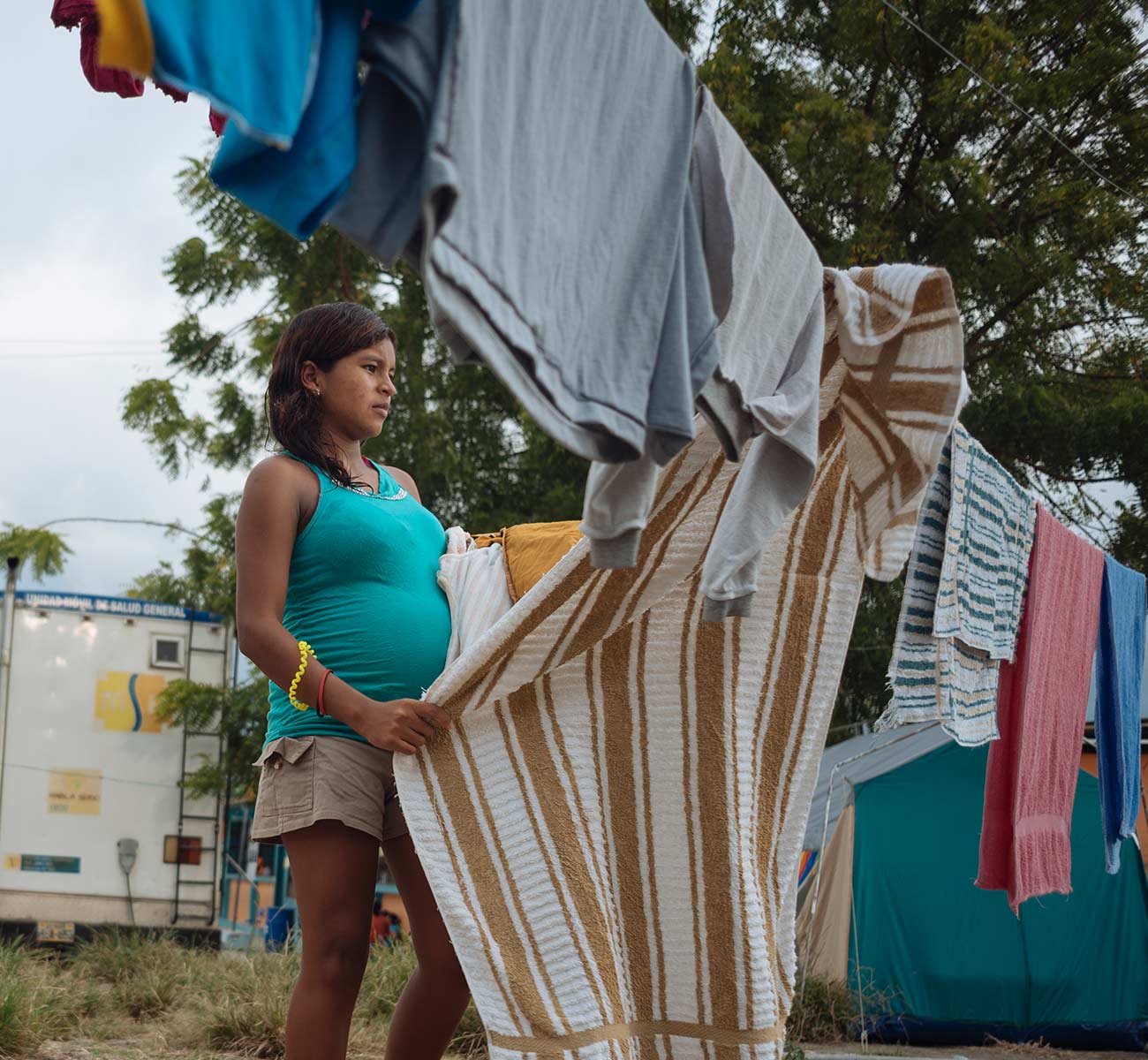 A pregnant ecuadorian woman worries what the fate of her unborn baby will be. Donation Form Background