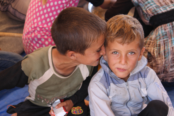 Two young Yazidi boys at the Nawrouz refugee camp. © UNICEF Syria/2014/Razan Rashidi
