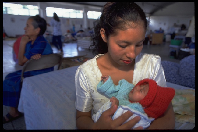 Mothers like this one in Miraflores, Honduras, need information to help keep their infants safe from the ZIka virus. 