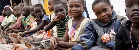 Children gather at a UNICEF-supported Child-Friendly Space at the Kakuma Refugee Camp in northwestern Kenya, one of the largest refugee camps in the world.