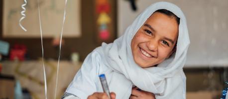 Ghana, 11, took part in an art activity at a UNICEF-supported Makani center in Jordan.