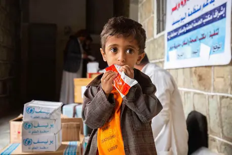 Raheb eats the Ready-to-Use Therapeutic Food
