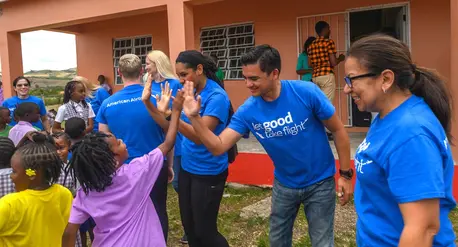 Champions visit education sites in Antigua and Barbuda supported by their UNICEF Change for Good collections