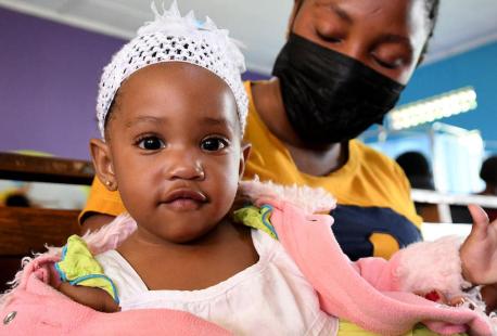 A girl is immunized at UNICEF-supported Fort Portal Regional Referral Hospital in Uganda.