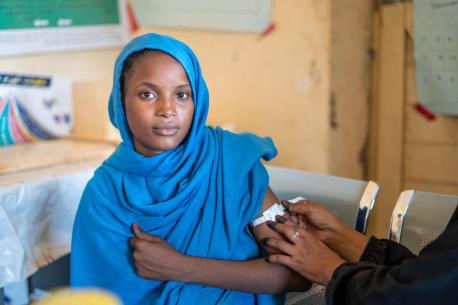 Hosnia Abdul, a pregnant and lactating mother with a 1-year-old son, is screened for malnutrition during an antenatal care visit at UNICEF-supported village health center in North Delta, Kassala state, Sudan.