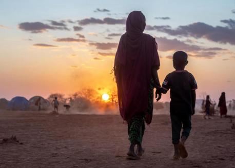 In Somali region of Ethiopia, near the town of Hargele, a mother and her son displaced by drought walk near the camp where they are staying.