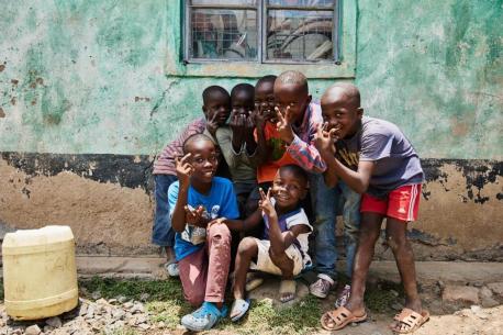 Children happily pose for a photo in Kisumu County, Kenya.