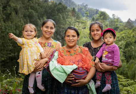 In Coban, Alta Verapaz, Guatemala, mothers hold their children, ages 0 to 3.