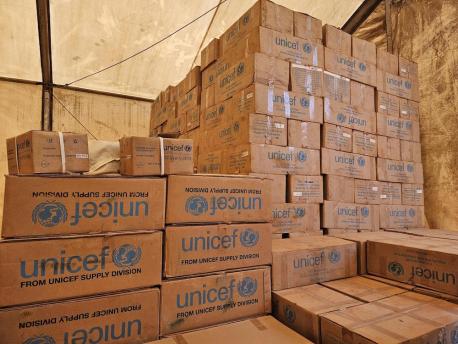 On May 24, 2023, UNICEF emergency supplies are stacked in a transit site in Roriak, Unity State, South Sudan, to be distributed to families fleeing conflict in Sudan.